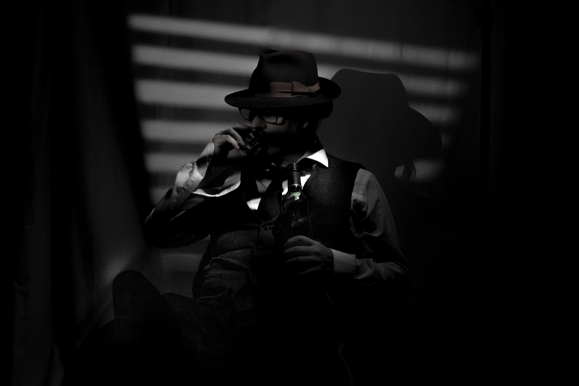 Film Noir detective in dark office